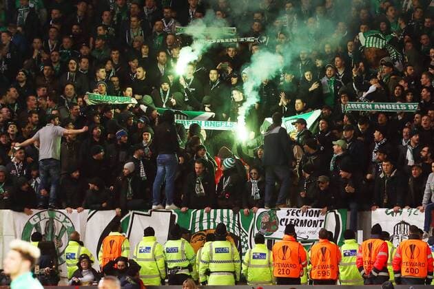 Saint-Etienne fans let off a flare during the UEFA Europa League Round of 32 1st leg match at Old Trafford Stadium, Manchester. Picture date: February 16th, 2017. Pic credit should read: Matt McNulty Sportimage EDITORIAL USE ONLY. No use with unauthorised audio, video, data, fixture lists, club league logos or live services. Online in-match use limited to 120 images, no video emulation. No use in betting, games or single club league player publications.