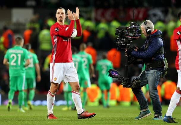 Zlatan Ibrahimovic of Manchester United ManU celebrates with the match ball after scoring a hat-trick at full time during the UEFA Europa League Round of 32 1st leg match at Old Trafford Stadium, Manchester. Picture date: February 16th, 2017. Pic credit should read: Matt McNulty Sportimage EDITORIAL USE ONLY. No use with unauthorised audio, video, data, fixture lists, club league logos or live services. Online in-match use limited to 120 images, no video emulation. No use in betting, games or single club league player publications.