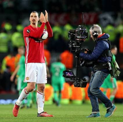 Zlatan Ibrahimovic of Manchester United ManU celebrates with the match ball after scoring a hat-trick at full time during the UEFA Europa League Round of 32 1st leg match at Old Trafford Stadium, Manchester. Picture date: February 16th, 2017. Pic credit should read: Matt McNulty Sportimage EDITORIAL USE ONLY. No use with unauthorised audio, video, data, fixture lists, club league logos or live services. Online in-match use limited to 120 images, no video emulation. No use in betting, games or single club league player publications.