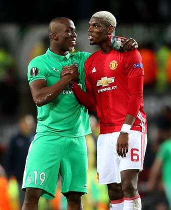 Paul Pogba of Manchester United ManU and brother Florentin Pogba of Saint Etienne at full time during the UEFA Europa League Round of 32 1st leg match at Old Trafford Stadium, Manchester. Picture date: February 16th, 2017. Pic credit should read: Matt McNulty Sportimage EDITORIAL USE ONLY. No use with unauthorised audio, video, data, fixture lists, club league logos or live services. Online in-match use limited to 120 images, no video emulation. No use in betting, games or single club league player publications.