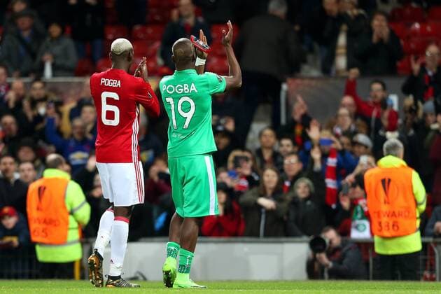 Paul Pogba of Manchester United ManU and brother Florentin Pogba of Saint Etienne at full time during the UEFA Europa League Round of 32 1st leg match at Old Trafford Stadium, Manchester. Picture date: February 16th, 2017. Pic credit should read: Matt McNulty Sportimage EDITORIAL USE ONLY. No use with unauthorised audio, video, data, fixture lists, club league logos or live services. Online in-match use limited to 120 images, no video emulation. No use in betting, games or single club league player publications.