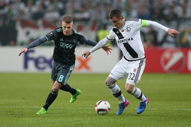 16.02.2017, Warszawa, pilka nozna, Liga Europy, Legia Warszawa - Ajax Amsterdam, Daley Sinkgraven (Ajax), Miroslav Radovic (Legia) at the Legia Warsaw versus Ajax Amsterdam, UEFA Europa League tie xTomaszxJastrzebowskix  ActionPlus11847030