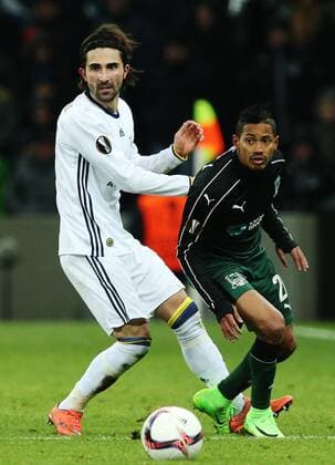 KRASNODAR, RUSSIA - FEBRUARY 16, 2017: Fenerbahce Istanbulâ€™s Hasan Ali Kaldirim (L) and FC Krasnodar s Ricardo Laborde fight for the ball in their 2016-17 UEFA Europa League Round of 32, 1st leg football match at Krasnodar Stadium. FC Krasnodar won the game 1-0. Vitaly Timkiv TASS  TS04175E