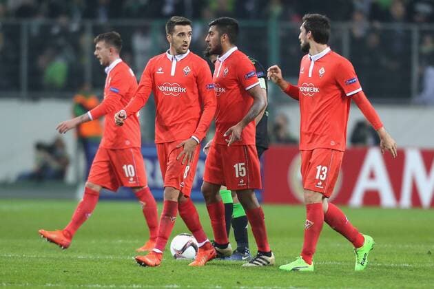 Gladbach, Germany 16.02.2017, Europa League, round of 32, 1st leg, Borussia Moenchengladbach - ACF Fiorentina, v.l.n.r. Federico Bernardeschi, Matias Vecino, Maximiliano Olivera, Davide Astori (ACF) nach dem 0-1. ( DeFodi512