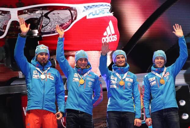 HOCHFILZEN, AUSTRIA - FEBRUARY 18, 2017: Biathletes Anton Shipulin, Anton Babikov, Maxim Tsvetkov, and Alexei Volkov of Russia, from left, pose with their gold medals at a victory ceremony for the men s 4x7.5km relay at the 2017 IBU Biathlon World Championships in Hochfilzen, Austria. Stanislav Krasilnikov TASS  TS041D1B