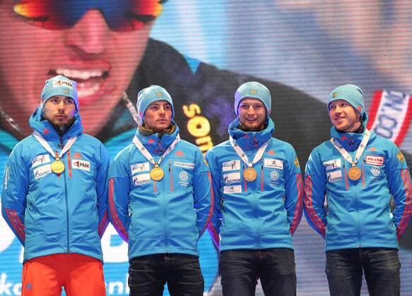HOCHFILZEN, AUSTRIA - FEBRUARY 18, 2017: Biathletes Anton Shipulin, Anton Babikov, Maxim Tsvetkov, and Alexei Volkov of Russia, from left, pose with their gold medals at a victory ceremony for the men s 4x7.5km relay at the 2017 IBU Biathlon World Championships in Hochfilzen, Austria. Stanislav Krasilnikov TASS  TS041D1E