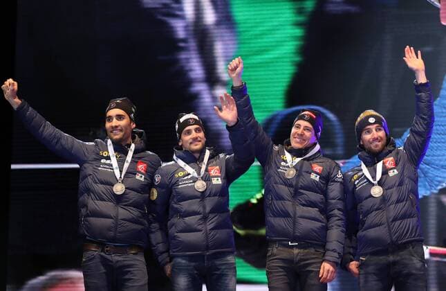 HOCHFILZEN, AUSTRIA - FEBRUARY 18, 2017: Biathletes Martin Fourcade, Simon Desthieux, Quentin Fillon Maillet, and Jean Guillaume Beatrix, from left, of France pose with their silver medals at a victory ceremony for the men s 4x7.5km relay at the 2017 IBU Biathlon World Championships in Hochfilzen, Austria. Stanislav Krasilnikov TASS  TS041D1F