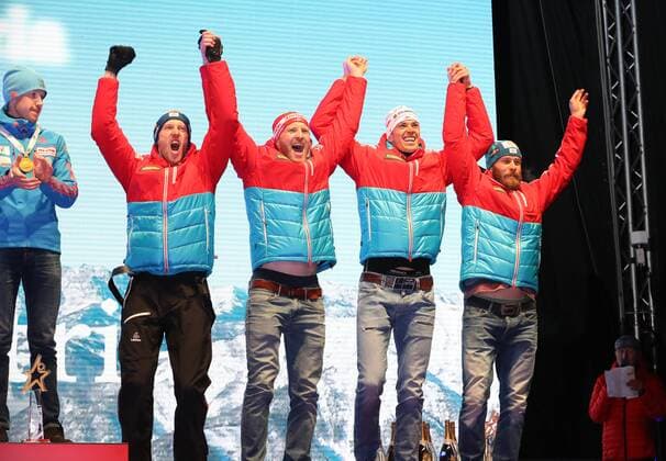 HOCHFILZEN, AUSTRIA - FEBRUARY 18, 2017: Bronze medallists Daniel Mesotitsch, Julian Eberhard, Simon Eder, Dominik Landertinger of Austria, from right, pose at a victory ceremony for the men s 4x7.5km relay at the 2017 IBU Biathlon World Championships in Hochfilzen, Austria. Stanislav Krasilnikov TASS  TS041D20