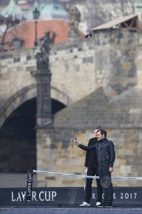 Switzerland s tennis player Roger Federer, right, and Czech Republic s Tomas Berdych, left, teke a selfie during a exhibition match on Vltava river in Prague, Czech Republic, Monday, February 20, 2017. Federer arrived in Prague to promote the Laver Cup, a tournament that will be held in Prague on Sept. 22-24, 2017, pitting six top European players against their counterparts from the rest of the world. The Charles Bridge is in the background. (CTKxPhoto MichalxKamaryt) CTKPhotoP201702200385801 kmt 6