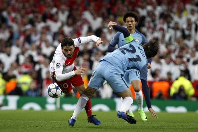 Football - 2016 2017 UEFA Champions League - Round of Sixteen, First Leg: Manchester City vs. Monaco Bernardo Silva of Monaco and David Silva of Manchester City during the match at the Etihad Stadium. COLORSPORT 
