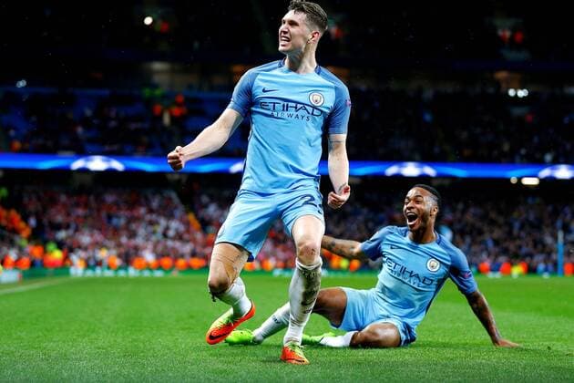 February 21st 2017, Etihad Stadium, Manchester, Lancashire, England; UEFA Champions League 1st Leg round of 16, Manchester City versus AS Monaco; John Stones of Manchester City celebrates scoring his teams fourth goal (4-3) as Sterling slides in to the celebration xPaulxKeevilx  ActionPlus11849130