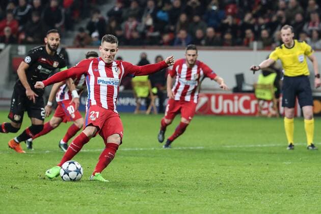(170222) -- LEVERKUSEN, Feb. 22, 2017 -- Atletico Madrid s Kevin Gameiro (front) takes a penalty kick during the first leg match of Round of 16 of European Champions League between Bayer 04 Leverkusen and Atletico Madrid in Leverkusen, Germany, on Feb. 21, 2017. Leverkusen lost 2-4. ) (SP)GERMANY-LEVERKUSEN-SOCCER-UEFA-UCL-LEVERKUSEN VS ATLETICO MADRID ShanxYuqi 