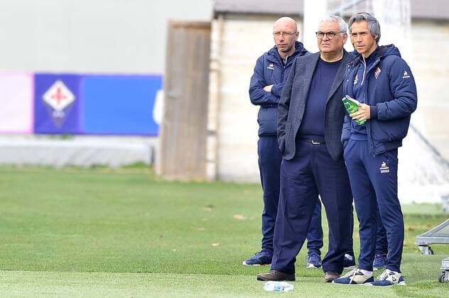 Italy: ACF Fiorentina training session A.c.f. Fiorentina s head coach Paulo Sousa (R) talks with the General Director of technical area Pantaleo Corvino (L) during the training session at the Team s Sports Centre on the eve of the UEFA Europa League Round of 32 - 2nd leg soccer match against Borussia Mönchengladbach.  GiacomoxMorinix xPacificxPress