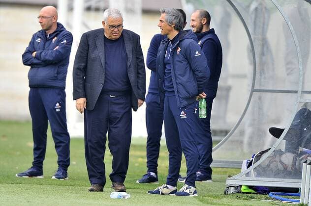 Italy: ACF Fiorentina training session A.c.f. Fiorentina s head coach Paulo Sousa (R) talks with the General Director of technical area Pantaleo Corvino (L) during the training session at the Team s Sports Centre on the eve of the UEFA Europa League Round of 32 - 2nd leg soccer match against Borussia Mönchengladbach.  GiacomoxMorinix xPacificxPress