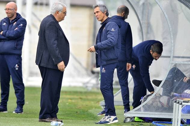 Italy: ACF Fiorentina training session A.c.f. Fiorentina s head coach Paulo Sousa (R) talks with the General Director of technical area Pantaleo Corvino (L) during the training session at the Team s Sports Centre on the eve of the UEFA Europa League Round of 32 - 2nd leg soccer match against Borussia Mönchengladbach.  GiacomoxMorinix xPacificxPress
