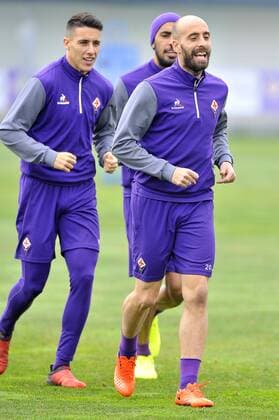 Italy: ACF Fiorentina training session A.c.f. Fiorentina s Cristian Tello (L) and Borja Valero (R) during the training session at the Team s Sports Centre on the eve of the UEFA Europa League Round of 32 - 2nd leg soccer match against Borussia Mönchengladbach.  GiacomoxMorinix xPacificxPress