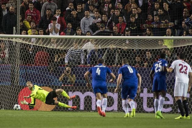 February 22, 2017 - Seville, Spain - Kasper Schmeichel of Leicester saves a penalty during the UEFA Champions League Round of 16 (first leg) soccer match between Sevilla FC and Leicester at Estadio Ramon Sanchez Pizjuan Soccer 2017 - Sevilla FC vs Leicester - ZUMAa142 20170222_zap_a142_005 Copyright: xDanielxGonzalezxAcunax