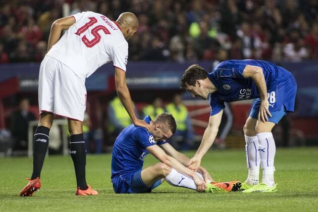 February 22, 2017 - Seville, Spain - Jamie Vardy of Leicester (C ) lies injured after receiving a foul from Steven N Zonzi of Sevilla (L ) during the UEFA Champions League Round of 16 (first leg) soccer match between Sevilla FC and Leicester at Estadio Ramon Sanchez Pizjuan Soccer 2017 - Sevilla FC vs Leicester - ZUMAa142 20170222_zap_a142_024 Copyright: xDanielxGonzalezxAcunax