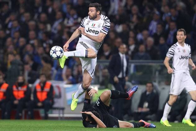 February 22, 2017 - Porto, Porto, Portugal - Andrea Barzagli defender of Juventus FC (R) vies with Porto s Brazilian forward Soares (UND) during the UEFA Champions League Round of 16 1st leg soccer match between FC Porto and Juventus, at Dragao Stadium in Porto on February 22, 2017. FC Porto v Juventus - UEFA Champions League Round of 16: First Leg  - ZUMAn230 20170222_zaa_n230_362 Copyright: xDpix