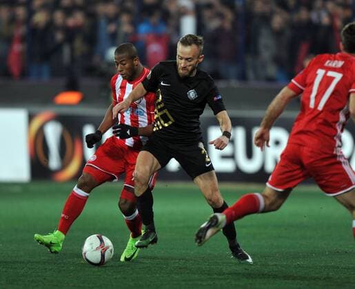 Osmanlispor s Avdija Vrsajevic and Olympiakos s Seba vie for the ball during the UEFA European League football match, between Osmanlispor and Olympiakos at Osmanli Stadyumu in Ankara, February 23, 2017. (  Copyright: HikmetxSaatci 15634899