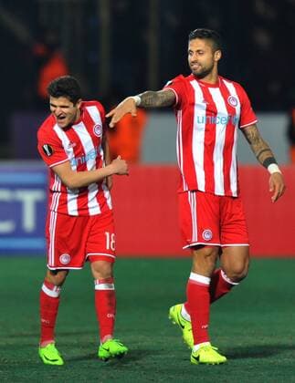 Olympiakos player Tarik Elyounoussi celebrates his goal with teammates during the UEFA European League football match, between Osmanlispor and Olympiakos at Osmanli Stadyumu in Ankara, February 23, 2017. (Hikmet Saatci - Depo Photos)  15634925