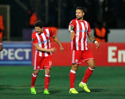 Olympiakos player Tarik Elyounoussi celebrates his goal with teammates during the UEFA European League football match, between Osmanlispor and Olympiakos at Osmanli Stadyumu in Ankara, February 23, 2017. (Hikmet Saatci - Depo Photos)  15634926