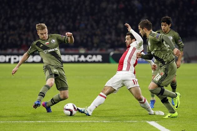 (L-R) Michal Kopczynski of Legia Warszawa, Amin Younes of Ajax, Lukasz Broz of Legia Warszawaduring the UEFA Europa League round of 16 match between Ajax Amsterdam and Legia Warsaw at the Amsterdam Arena on February 23, 2017 in Amsterdam, The Netherlands Ajax v Legia Warschau UEFA Europa League 2016 2017 xVIxxIVx 7183913