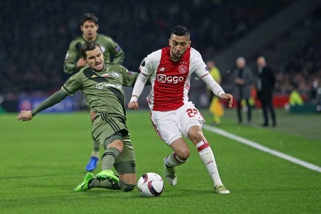 AMSTERDAM 23.02.2017 UEFA EUROPA LEAGUE SECOND LEG MATCH: AJAX AMSTERDAM - LEGIA WARSAW: LUKASZ BROZ, HAKIM ZIYECH  20170223CSLG0030