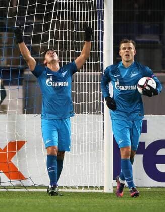 ST PETERSBURG, RUSSIA - FEBRUARY 23, 2017: Zenit St Petersburg s Victor Giuliano (L) and Alexander Kokorin celebrate scoring in their 2016-17 UEFA Europa League Round of 32, 2nd leg football match against RSC Anderlecht Brussels at Petrovsky Stadium. Alexander Demianchuk TASS  TS04261A