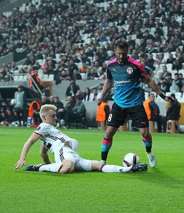UEFA Europa League match between Besiktas and Hapoel Beer Sheva at Vodafone Arena in Istanbul , Turkey on February 23, 2017. Pictured: Andreas Beck (L) of Besiktas and Mohammad Ghadir of Hapoel Beer Sheva. 