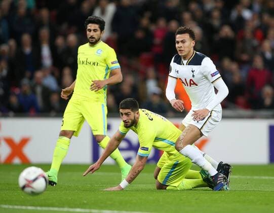Tottenham s Dele Alli tussles with Gent s Samuel Gigot during the Europa League Round of 32 Cup match at the Wembley Stadium, London. Picture date February 23rd, 2017 Pic David Klein Sportimage EDITORIAL USE ONLY. No use with unauthorised audio, video, data, fixture lists, club league logos or live services. Online in-match use limited to 120 images, no video emulation. No use in betting, games or single club league player publications.