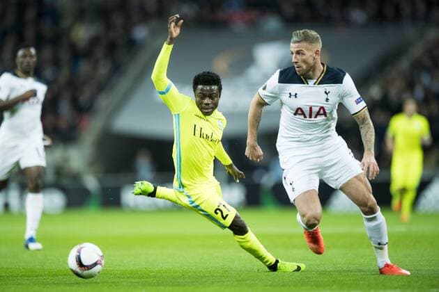 Gent s Moses Simon and Tottenham s defender Toby Alderweireld fight for the ball during a game between British team Tottenham and Belgian soccer team KAA Gent, return leg of the 1 16 finals of the Europa League competition, in Wembley stadium, London, Thursday 23 February 2017. Gent won the first leg 1-0. JASPERxJACOBS  x05053464x