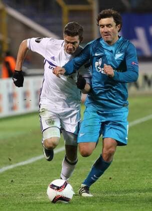 Anderlecht s Alexandru Chipciu and Zenit s midfielder s Yuri Zhirkov fight for the ball during a game between Russian team FC Zenit and Belgian soccer team RSC Anderlecht, return leg of the 1 16 finals of the Europa League competition, Thursday 23 February 2017, in Saint Petersburg, Russia. Anderlecht won 2-0 the first leg. VIRGINIExLEFOUR  x05053481x