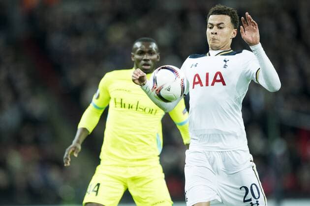 Gent s Anderson Esiti and Tottenham s midfielder Dele Alli fight for the ball during a game between British team Tottenham and Belgian soccer team KAA Gent, return leg of the 1 16 finals of the Europa League competition, in Wembley stadium, London, Thursday 23 February 2017. Gent won the first leg 1-0. JASPERxJACOBS  x05053461x