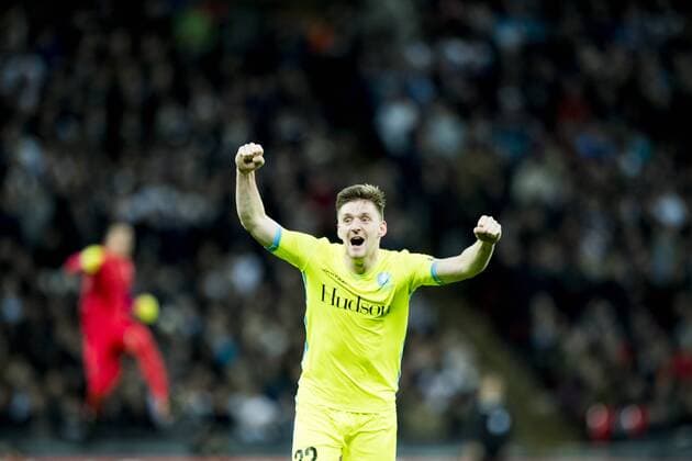 Gent s Thomas Foket celebrates after the 1-1 goal during a game between British team Tottenham and Belgian soccer team KAA Gent, return leg of the 1 16 finals of the Europa League competition, in Wembley stadium, London, Thursday 23 February 2017. Gent won the first leg 1-0. JASPERxJACOBS  x05053490x