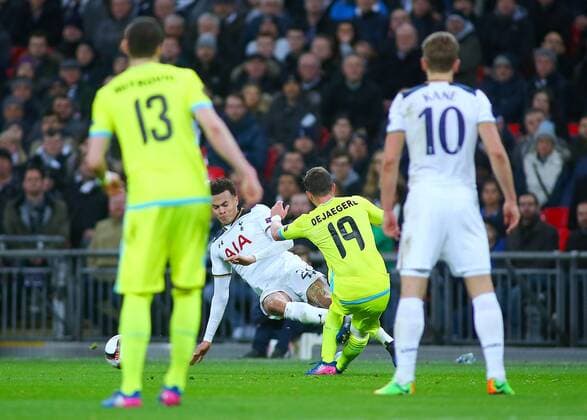 February 23rd 2017, Wembley Stadium, London, England; UEFA Europa League football, 2nd leg, Tottenham Hotspur versus KAA Gent; Dele Alli of Tottenham with an over the ball bad challenge on Brecht Dejaegere of Gent and is shown a straight Red Card in the 39th minute by Referee Manuel de Sousa xMarkxKertonx  ActionPlus11849489