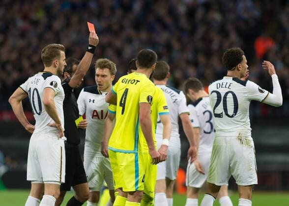Dele Alli of Tottenham Hotspur is shown the red card during the UEFA Europa League Round of 32 Game 2 match between Tottenham Hotspur and Gent at Wembley Stadium, London, England on 23 February 2017. Copyright: xVincexxMignottx 14290016