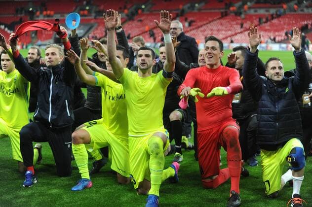 Football - 2016 2017 Europa League - Group of Thirty-Two, Second Leg: Tottenham Hotspur 0 vs. KAA Gent 1 Gent team celebrate with the fans after the match at Wembley. COLORSPORT ANDREW COWIE 