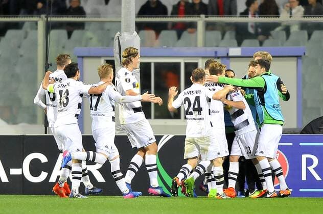 Italy: Acf Fiorentina vs Borussia Mönchengladbach Borussia Mönchengladbach s Andreas Christensen celebrates with his teammates after scoring the 4° goal during the UEFA Europa League Round of 32 - 2nd leg soccer match A.c.f. Fiorentina vs Borussia Mönchengladbach at Artemio Franchi Stadium.  GiacomoxMorinix xPacificxPress