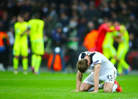 February 23rd 2017, Wembley Stadium, London, England; UEFA Europa League football, 2nd leg, Tottenham Hotspur versus KAA Gent; Eric Dier of Tottenham falls to the floor dejected after Jeremy Perbet of Gent levels the score at 2-2, and KAA Gent players celebrate in the background xMarkxKertonx  ActionPlus11849569