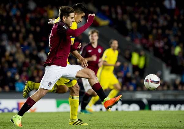 Sparta s Ales Cermak, left, and Christian Noboa of Rostov in action during the Europa League round of 32 play off soccer match between AC Sparta Praha and FK Rostov in Prague, Czech Republic, on Thursday, February 23, 2017. (CTKxPhoto VitxSimanek) CTKPhotoP201702231126401  VIS 006