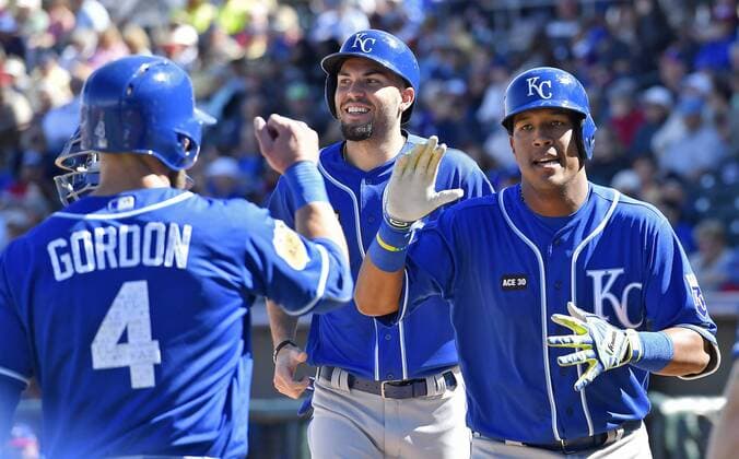 February 25, 2017 - Surprise, AZ, USA - The Kansas City Royals Salvador Perez, right, is congratulated by Alex Gordon (4) and Eric Hosmer after Perez hit a three-run home run during a spring training game against the Texas Rangers in Surprise, Ariz., on Saturday, Feb. 25, 2017. The Royals won, 7-5. Spring training: Kansas City at Texas - ZUMAm67_ 20170225_zaf_m67_106 Copyright: xJohnxSleezerx