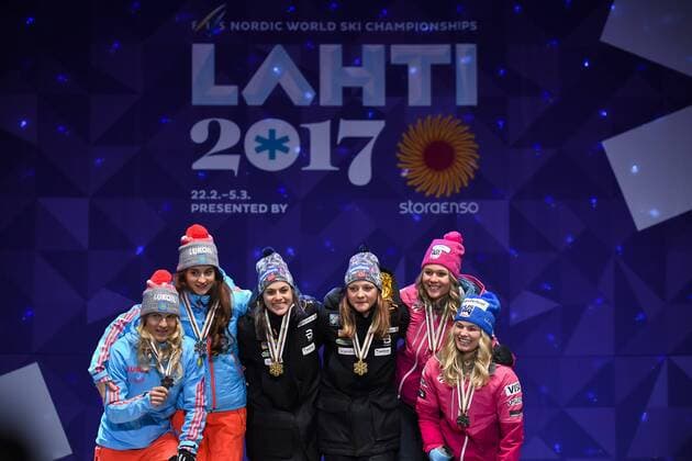 Bilder des Tages - SPORT 170226 Yulia Belorukova - Natalia Matveeva, (RUS), Sadie Bjornsen - Jessica Diggins, USA, Heidi Weng - Maiken Caspersen Falla, (NOR) - Langlauf Teamsprint - Siegerehrung - Nordische SKI WWM den 26 februar 2017 i Lahti.  Copyright: CARLxSANDIN BB170226CS115