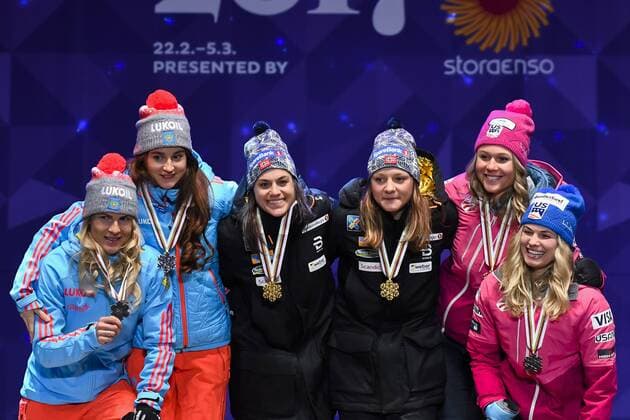 170226 Yulia Belorukova - Natalia Matveeva, (RUS), Sadie Bjornsen - Jessica Diggins, USA, Heidi Weng - Maiken Caspersen Falla, (NOR) - Langlauf Teamsprint - Siegerehrung - Nordische SKI WWM den 26 februar 2017 i Lahti.  Copyright: CARLxSANDIN BB170226CS116