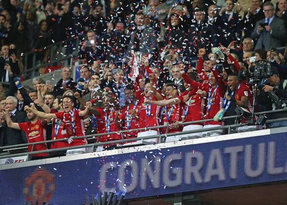 February 26th 2017, Wembley Stadium, London, England; EFL League Cup final, Southampton v Manchester United ManU Wayne Rooney of Manchester United lifts the EFL Trophy from the stands xJohnxPatrickxFletcherx  ActionPlus11851122