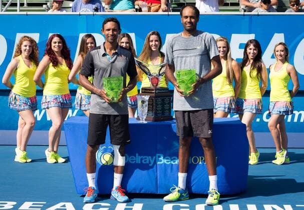 February 26, 2017: Raven Klaasen, of South Africa, and Rajeev Ram, of the United States pose with their doubles championship trophies of the 2017 Delray Beach Open professional tennis tournament, with the VolleyGirls in the background, played at the Delray Beach Stadium & Tennis Center in Delray Beach, Florida, USA. Rajeev Ram and Raven Klaasen defeated Treat Huey and Max Mirnyi 7-5, 7-5 in the doubles final. CSM. Tennis 2017: ATP Tennis Herren Delray Beach Open FEB 26 - ZUMAc04_ 20170226_zaf_c04_050 Copyright: xMarioxHoubenx