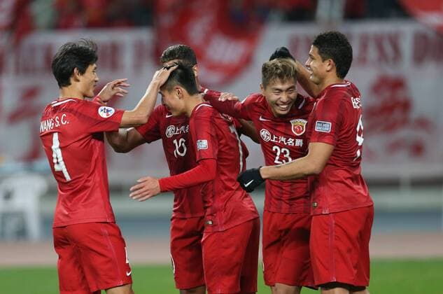 (170228) -- SHANGHAI, Feb. 28, 2017 -- Players of China s Shanghai SIPG FC celebrate Wu Lei s goal during the AFC Champions League Group F match against Australia s Western Sydney Wanderers at Shanghai Stadium in Shanghai, east China, Feb. 28, 2017. Shanghai SIPG FC won 5-1. ) (wll) (SP)CHINA-SHANGHAI-SOCCER-AFC CHAMPIONS LEAGUE-SHANGHAI SIPG FC VS WESTERN SYDNEY WANDERERS(CN) DingxTing 