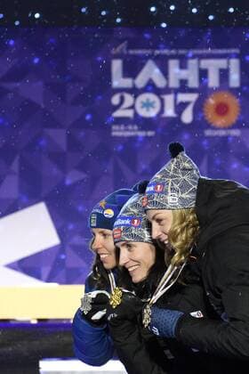 Ski Nordisch, WM in Lahti, Siegerehrung 10km Langlauf der Damen am Abend Charlotte Kalla, Sverige, Marit Björgen, Norge und Astrid Uhrenholdt Jacobsen, Norge 10km klassisch Lahti.  Copyright: CARLxSANDIN BB170228CS196