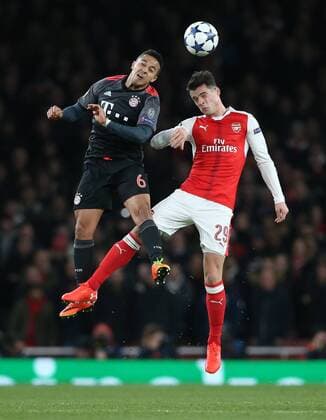 Fußball, CL, FC Arsenal - Bayern München Arsenal s Granit Xhaka tussles with Munich s Thiago Alcantara during the Champions League Round of 16 match at the Emirates Stadium, London. Picture date March 7th, 2017 Pic David Klein Sportimage EDITORIAL USE ONLY. No use with unauthorised audio, video, data, fixture lists, club league logos or live services. Online in-match use limited to 120 images, no video emulation. No use in betting, games or single club league player publications.