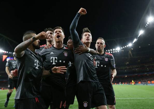 Munich s Robert Lewandowski celebrates soring his sides opening goal during the Champions League Round of 16 match at the Emirates Stadium, London. Picture date March 7th, 2017 Pic David Klein Sportimage EDITORIAL USE ONLY. No use with unauthorised audio, video, data, fixture lists, club league logos or live services. Online in-match use limited to 120 images, no video emulation. No use in betting, games or single club league player publications.